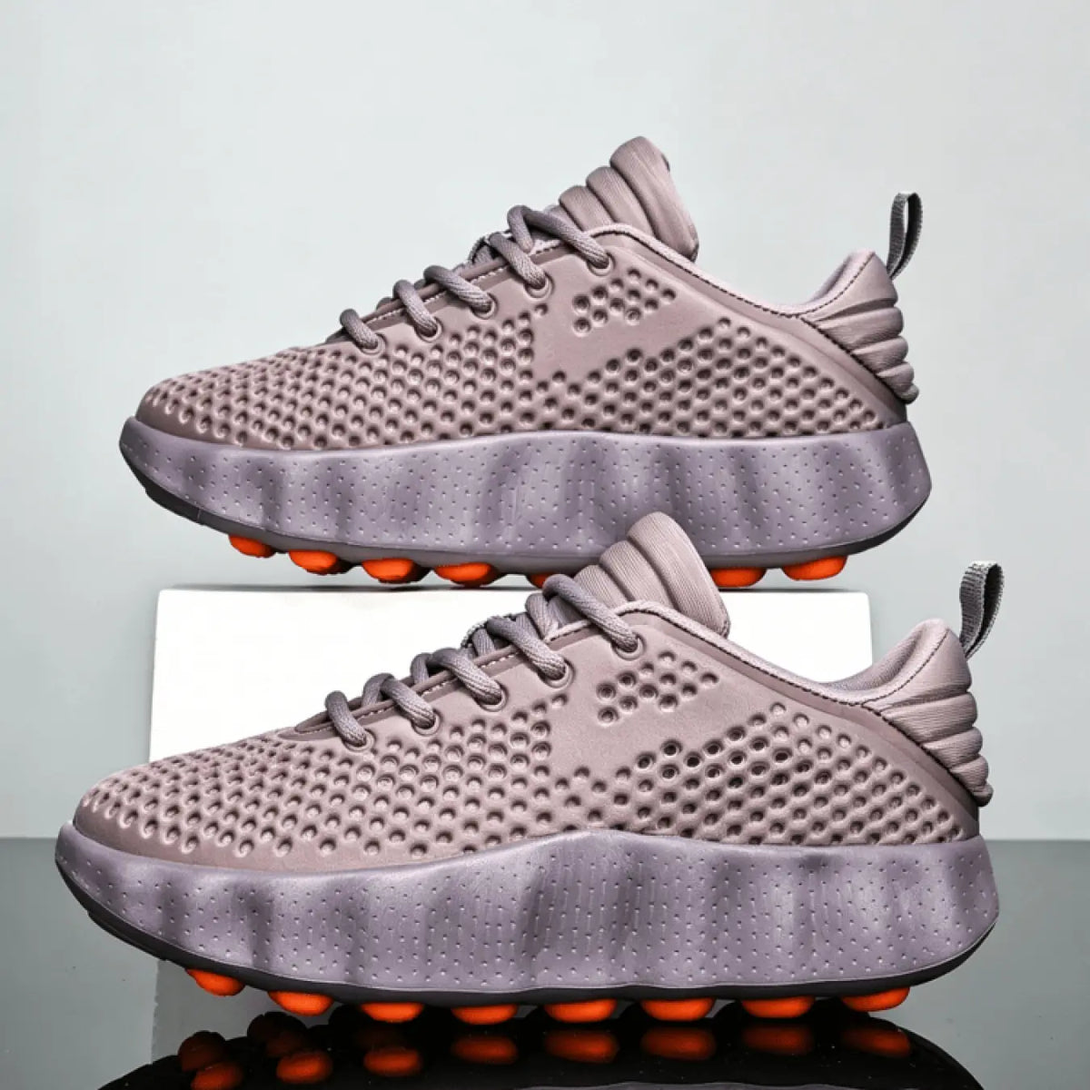 Black Mesh Running Sneakers with Chunky Orange-Studded Sole
